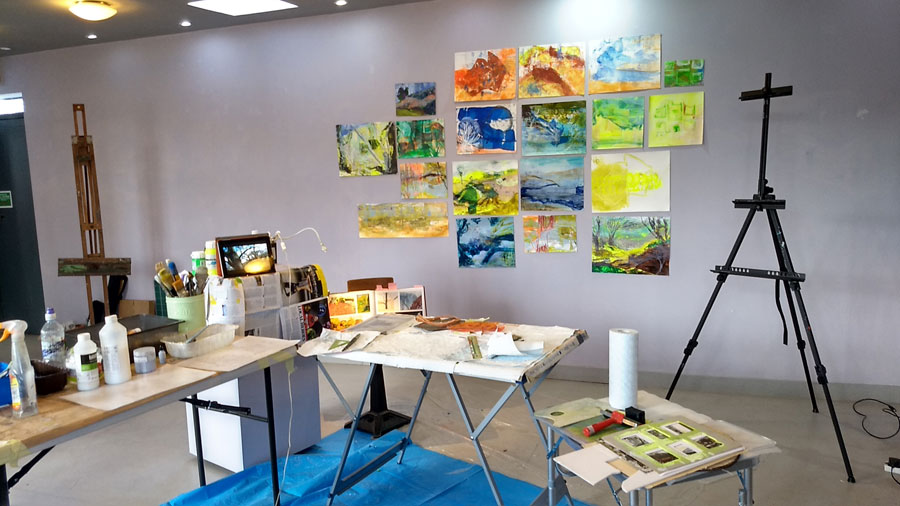 Studio space, abstract paintings and easel