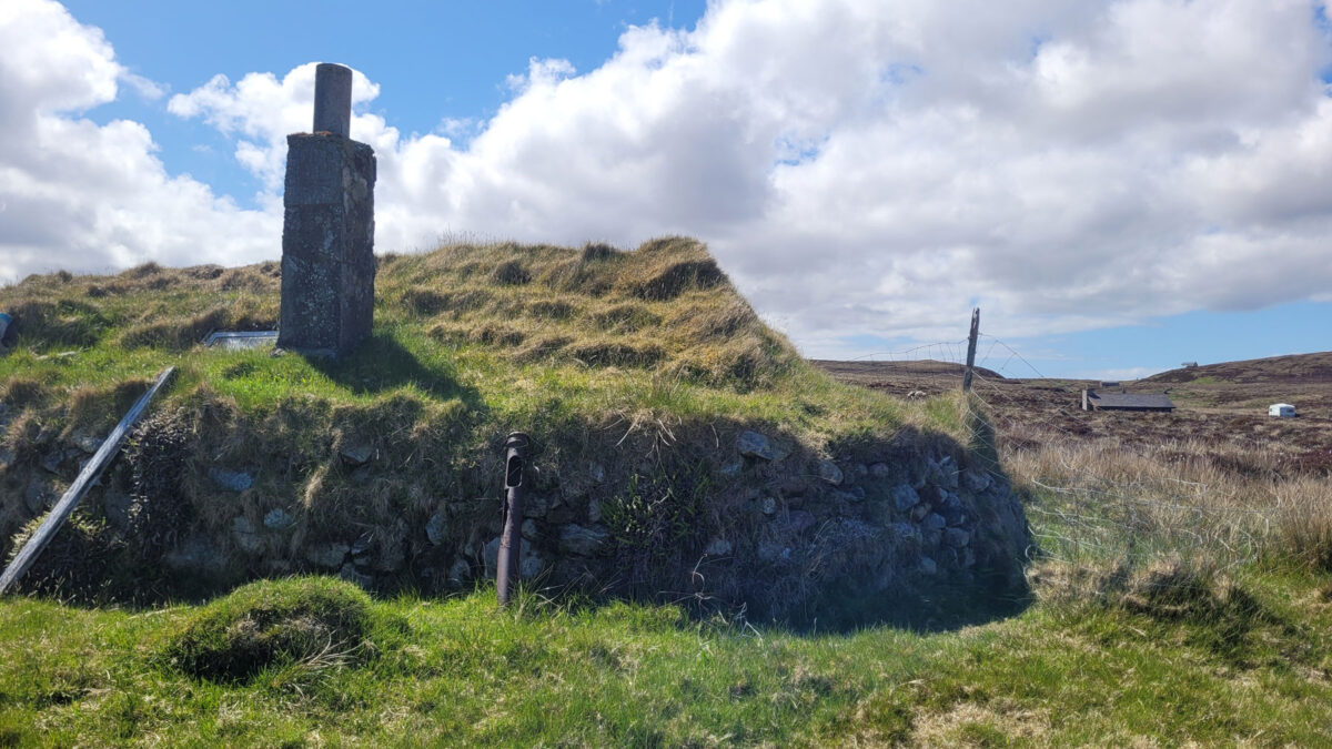 Ruined sod-roof hut at Cuidhsiadar on the Isle of Lewis