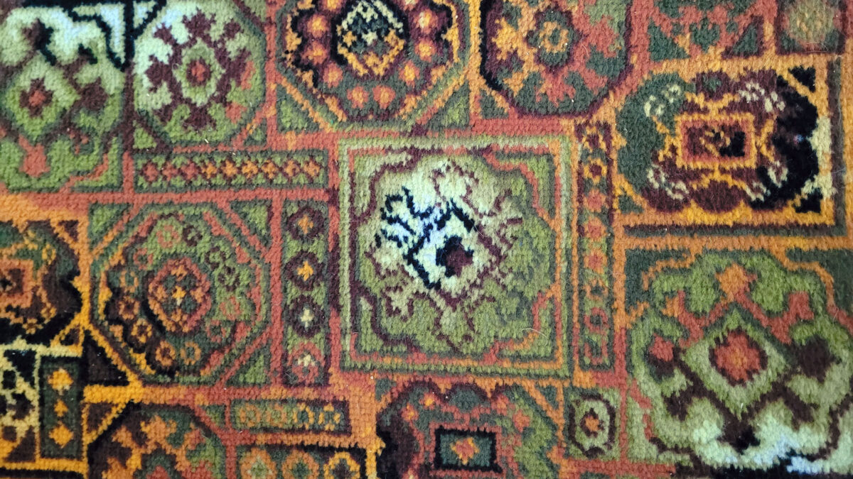 Orange 1970s carpet in croft house at Sandwick